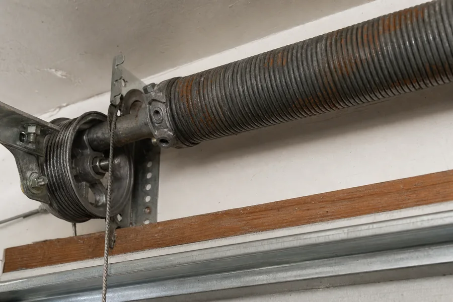 Torsion spring, shaft and cable drum above a garage door in Kent, WA